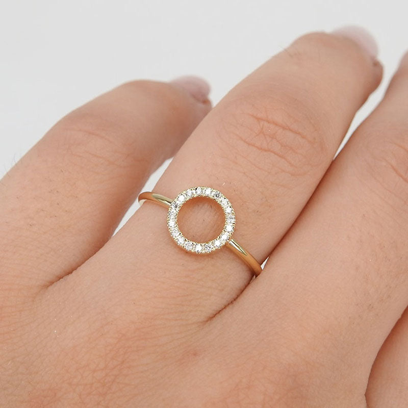 Person wearing Halo Ring with close up shot of fingers part of hand showing