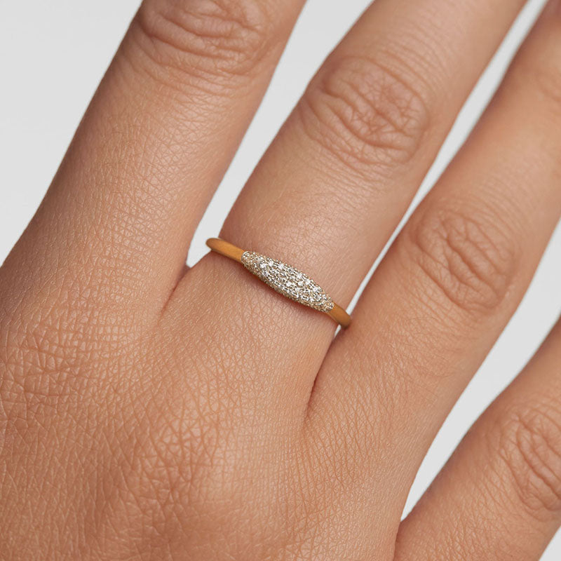 Person Wearing Ziba ring with close up shot of finger with part of hand showing